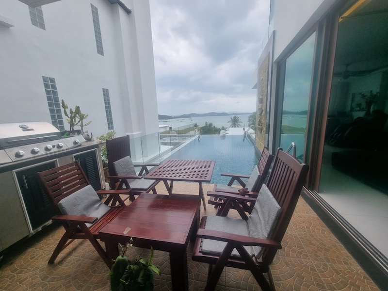 Photo Villa avec piscine et vue panoramique sur la mer à vendre à Ao Po