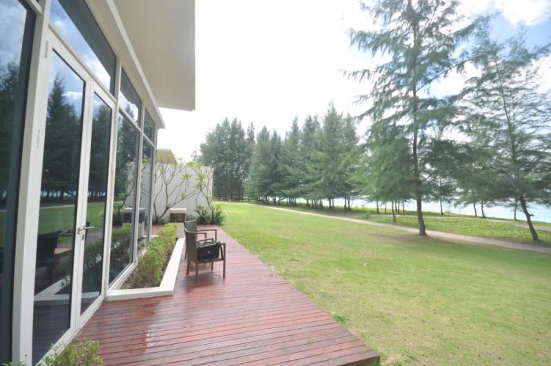 Photo Beach Front Pool Villa 3-bedroom for sale located in Mai Khao, Phuket.