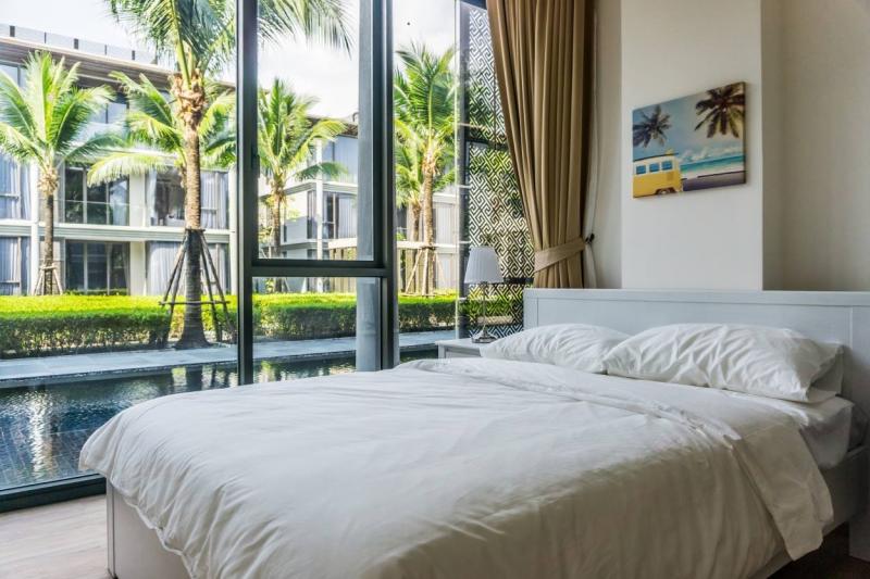 Фото Роскошные апартаменты с 2 спальнями на берегу моря на продажу и в аренду на пляже Май Кхао, Пхукет