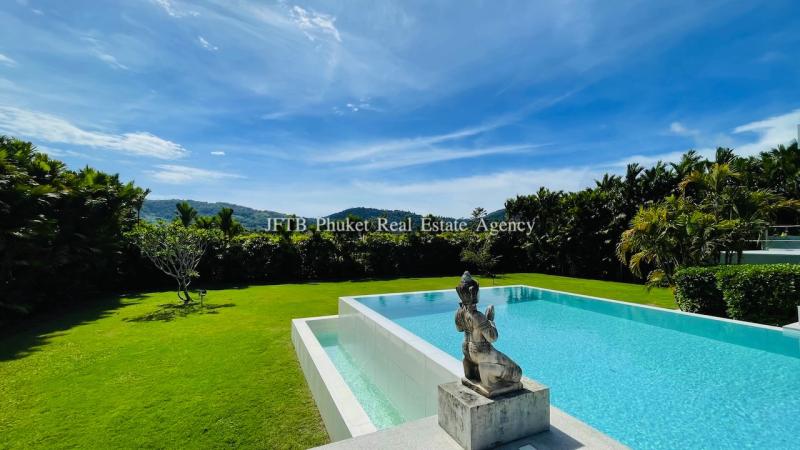 Photo Villa de rêve avec piscine à débordement à vendre à Nai Harn