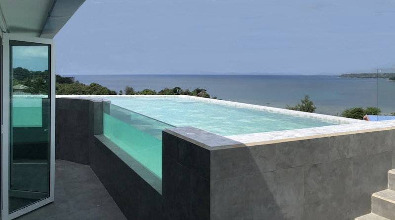 Photo Penthouse unique de 2 chambres avec vue imprenable sur la mer avec piscine privée à vendre à Kamala, Phuket.